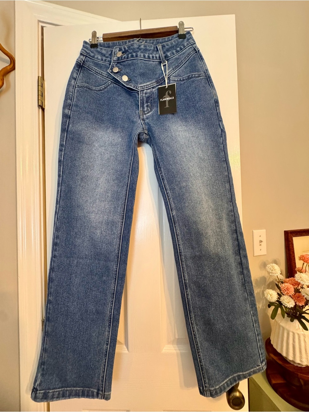 Flared High-Rise Blue Jeans with Asymmetric Waist Detail